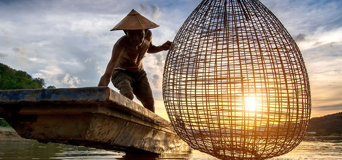 Fischer auf dem morgendlichen Mekong